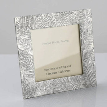 Large Foxworthy photo frame by Lancaster & Gibbings, showcasing a stylish wooden picture frame with a natural finish.