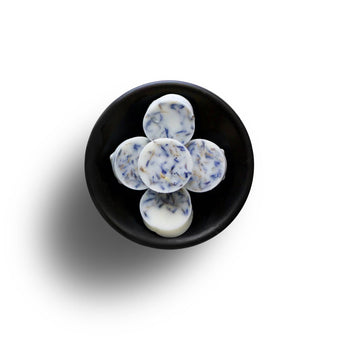 Freckleface Clean Laundry Soya Wax Melts in a clear container with a fresh, clean scent.