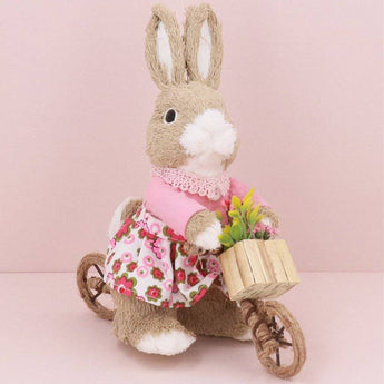 Gisela Graham girl bunny on bike bristle ornament, 24cm, featuring a charming bunny riding a bicycle, ideal for holiday decor.