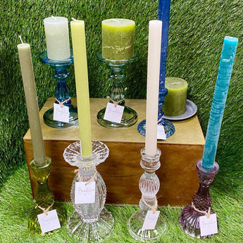 Clear glass candle holder Bella by Grand Illusions, with a sleek, elegant design perfect for displaying candles.