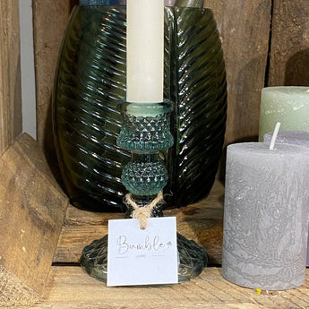 Green glass candle holder with a harlequin pattern, featuring a classic design by Grand Illusions.