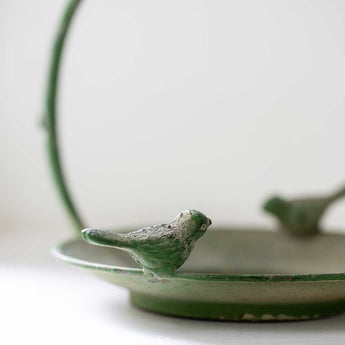 Antique green hanging metal bird feeder with decorative design, suitable for garden bird feeding.