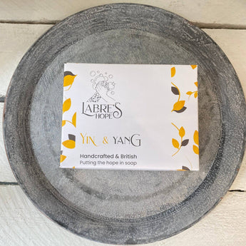 Labre's Hope Yin and Yang soap with black and white swirls, showcasing a natural, handcrafted soap bar with yin and yang design.