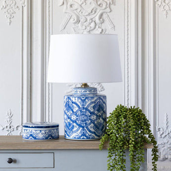 Grand Illusions Lamp Ruban with white shade, elegant table lamp featuring a sleek design and soft white fabric shade.