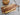 Rectangular acacia wood tapas serving board by Chic Antique, ideal for presenting appetizers and small snacks.