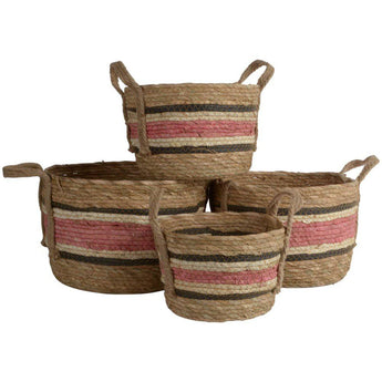 Large natural and rose-colored wicker basket made from corn and straw, perfect for storage or decorative use.