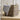 Large square Kubu log basket from Grand Illusions, woven wicker basket with sturdy handles and spacious storage capacity.
