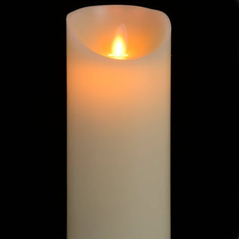 Three cream flickering flame LED wax candles from Hills Interiors Luxe Collection, flameless candles with realistic candlelight effect.