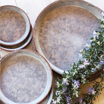 Small zinc tray by Casa Verde, showing a rustic metal tray with raised edges, ideal for decorative or functional use.