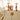 Plum & Ashby Neroli & Bergamot scented candle in a glass jar with a lit wick, showcasing its elegant design and fresh citrus aroma.