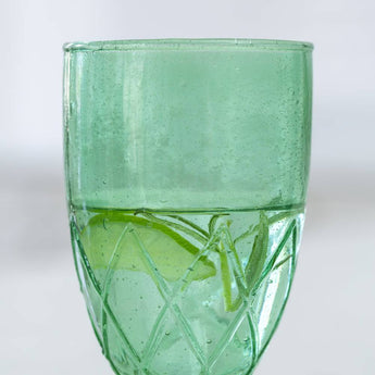 Sea green recycled bubble wine glass by Grand Illusions featuring a textured, eco-friendly design and elegant shape.
