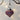 Red glitter mini onion-shaped bauble by Grand Illusions, featuring a shiny, festive decoration with a textured glitter surface.
