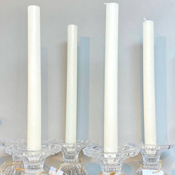 Ivory rustic dinner candle from Grand Illusions, 23x270mm, with a natural textured surface and elegant shape.