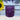 Rustic amethyst pillar candle by Grand Illusions, 100x100mm, showcasing a textured purple candle with a natural, rustic finish.