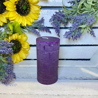 Rustic amethyst pillar candle by Grand Illusions, 70x130mm, with textured surface and natural stone appearance.