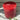 Rustic red pillar candle by Grand Illusions, 100x100mm, showing a textured surface and warm candle glow.