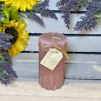 Rustic scalloped dusky pink pillar candle by Grand Illusions, 70x130mm, showing textured finish and decorative scalloped edge.