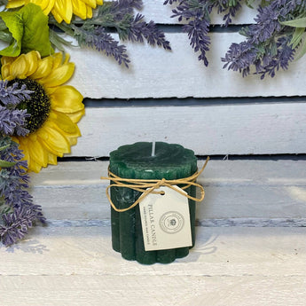 Emerald green rustic scalloped pillar candle from Grand Illusions, 70x75mm, with textured, decorative ridges.