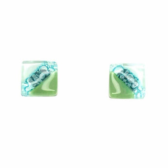 Sea foam green square glass earrings by Bumble Living, large statement jewelry with geometric design and transparent finish.