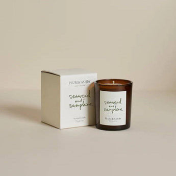 Seaweed and samphire scented votive candle from Plum & Ashby, with a glass holder and natural botanical design.