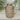 Casa Verde stone vertical pattern bottle vase featuring a sleek, modern design with textured stone surface and a narrow neck.
