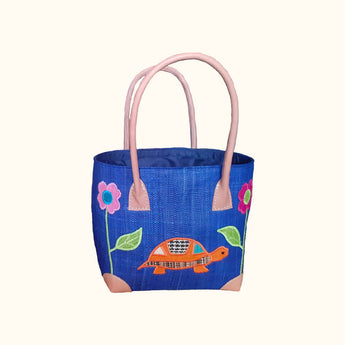Navy tortoise-patterned small tote bag by Basket Basket, showing its compact size and stylish design for everyday use.