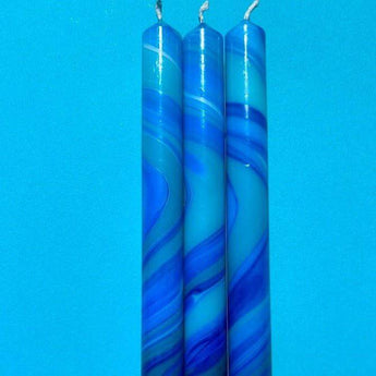 Set of three marbled tropical storm dinner candles by Colour Emporium, featuring vibrant swirling patterns for elegant table decor.