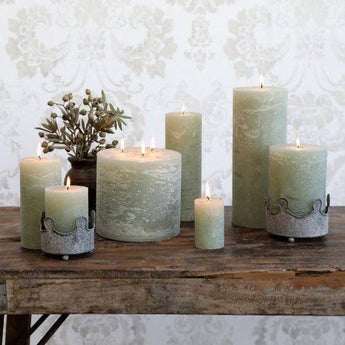 Rustic beige Verte Pillar Candle by Chic Antique, 150-hour burn time, with textured surface and classic pillar shape.