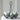 Wire egg holder by Grand Illusions, designed to securely hold eggs in a stylish wire display.
